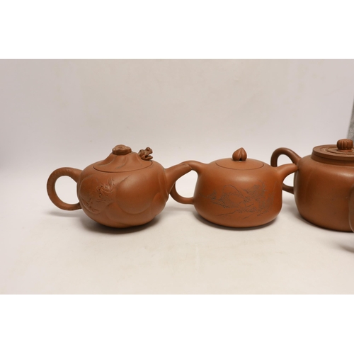 1407 - Six Chinese Yixing terracotta teapots, largest 11cm