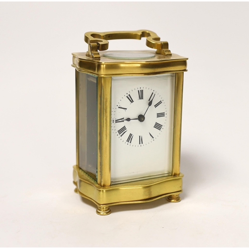 1409 - A French gilt metal carriage timepiece, 16cm high