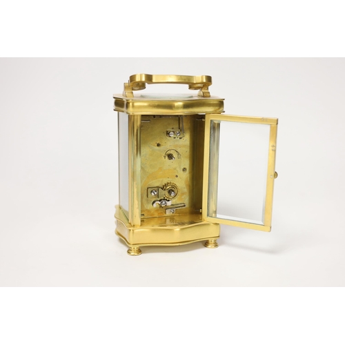 1409 - A French gilt metal carriage timepiece, 16cm high