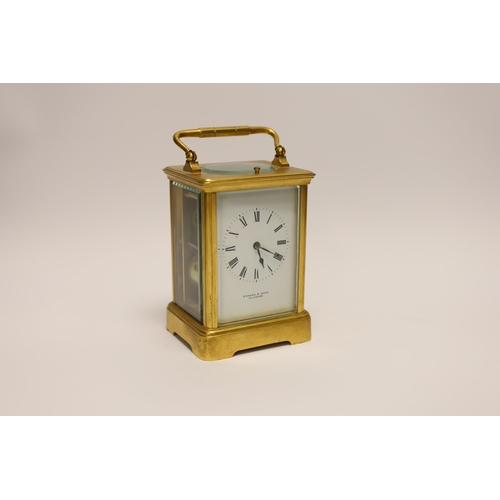 1413 - A gilt brass carriage clock with repeater, the dial inscribed Edward & Sons Glasgow, 18cm high... 