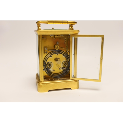 1413 - A gilt brass carriage clock with repeater, the dial inscribed Edward & Sons Glasgow, 18cm high... 