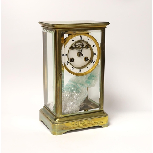 1418 - A late 19th century French brass four-glass mantel clock, striking on a bell, engraved to base, with... 