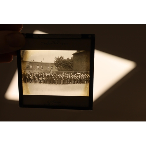 1422 - Two boxed sets of photographic magic lantern slides including military and a mahogany cased collecti... 