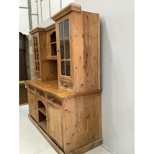 116 - A Victorian style pine dresser with glazed cupboards, width 186cm, depth 68cm, height 203cm