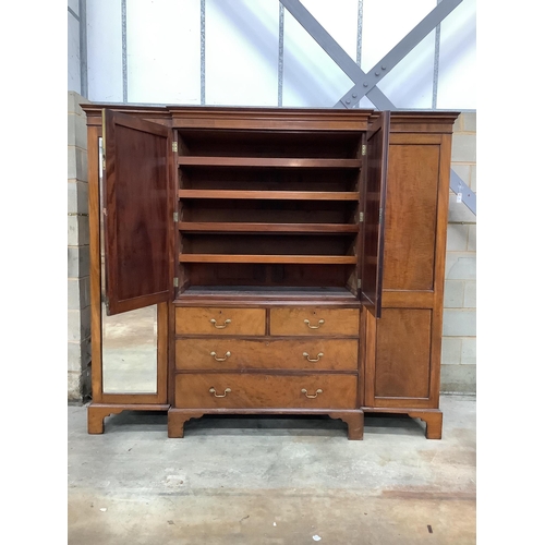 128 - A 19th century and later mahogany breakfront wardrobe with linen press centre section, width 224cm, ... 