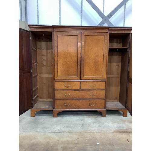 128 - A 19th century and later mahogany breakfront wardrobe with linen press centre section, width 224cm, ... 