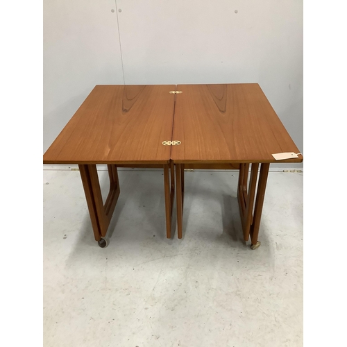 137 - A McIntosh mid century teak triform nest of tables, width 74cm, depth 40cm, height 61cm