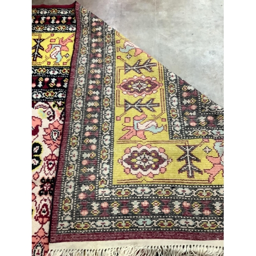 141 - A Turkish carpet, approx. 380 x 350cm