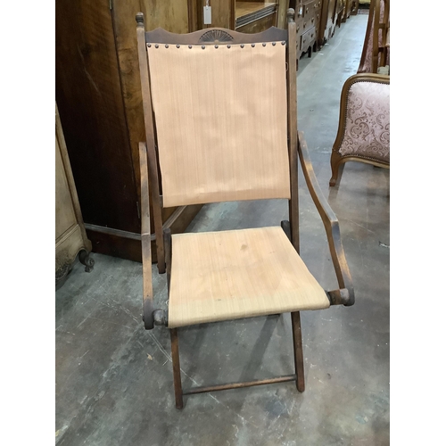 142 - Two Edwardian beech folding garden chairs