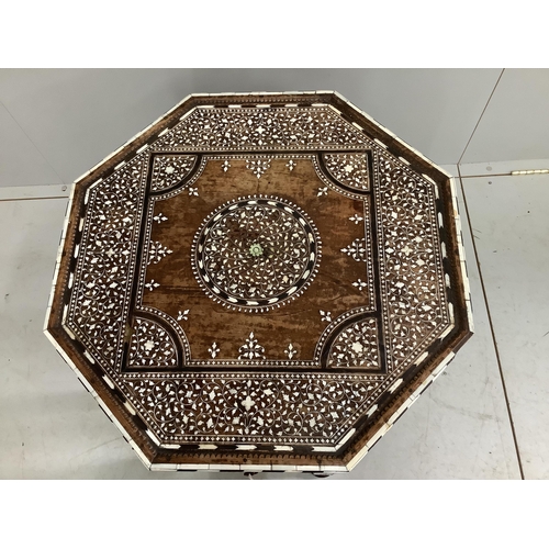 144 - A 19th century Indian Hoshiarpur brass mounted octagonal bone inlaid table, fitted two drawers on tu... 