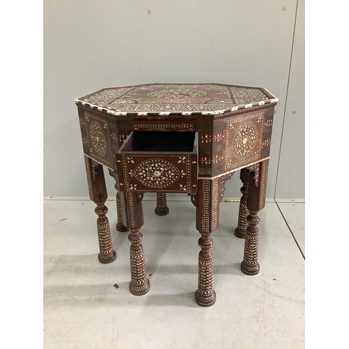 144 - A 19th century Indian Hoshiarpur brass mounted octagonal bone inlaid table, fitted two drawers on tu... 