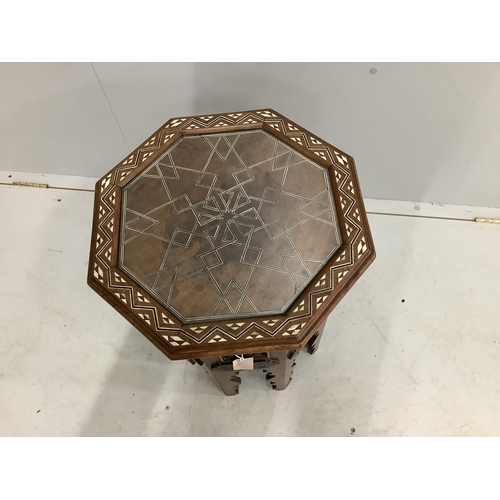 145 - A Syrian bone inlaid octagonal occasional table, width 40cm, height 56cm