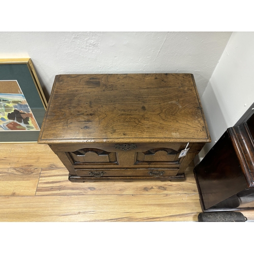 150 - A mid 18th century Welsh oak coffer back with twin panelled front, width 65cm, depth 36cm, height 47... 