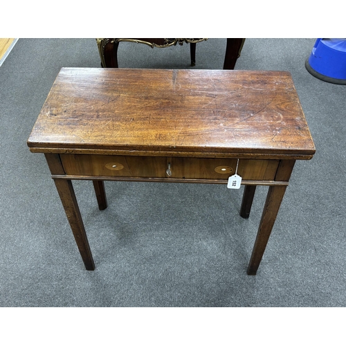 152 - A George III rectangular mahogany folding tea table, width 75cm, depth 37cm, height 72cm.