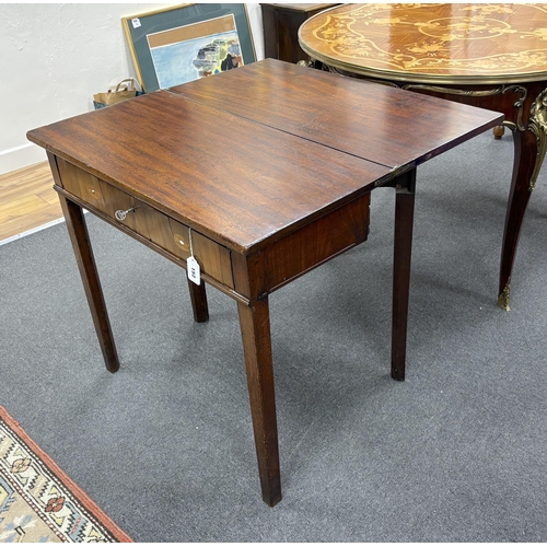 152 - A George III rectangular mahogany folding tea table, width 75cm, depth 37cm, height 72cm.