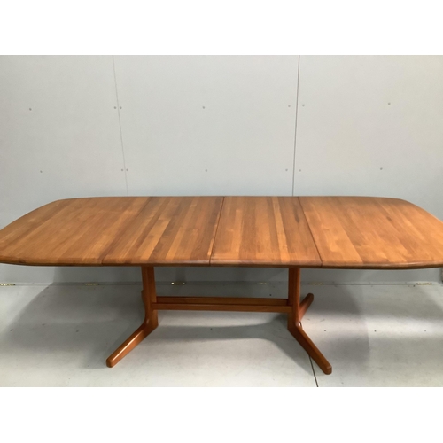 28 - A mid century teak extending dining table, length 150cm, width 106cm, height 74cm and six chairs, tw... 