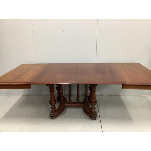 35 - A 19th century and later French mahogany extending dining table, 232cm extended, two spare leaves, d... 