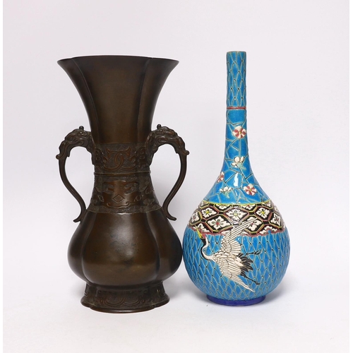 379 - A 19th century Japanese bronze flower vase, with a Japanese enamelled pottery bottle, Meiji, tallest... 