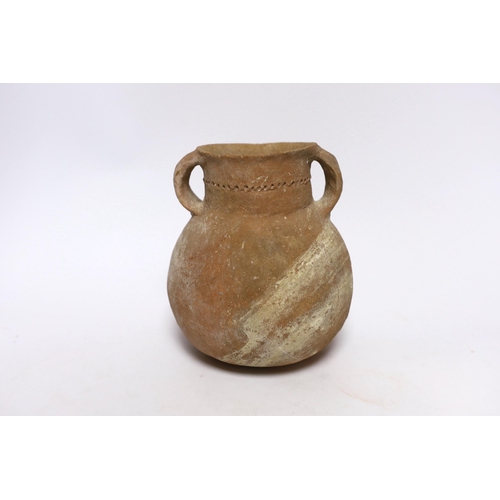 386 - An intact Roman terracotta two handled jar, 17.5cm high