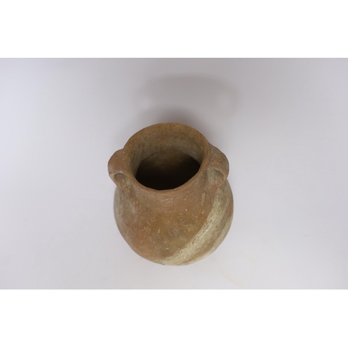 386 - An intact Roman terracotta two handled jar, 17.5cm high