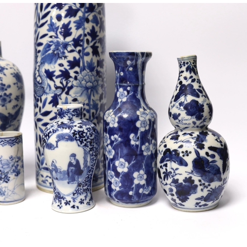 392 - Seven assorted late 19th century Chinese blue and white vases (a.f.), tallest 35.5cm