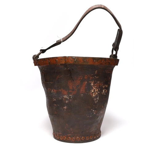 394 - A painted leather fire bucket with the remains of what might have been an armorial crest, 26.5cm hig... 