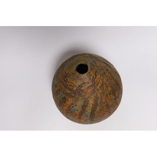 395 - A Pre-Columbian style ovoid earthenware vase, 26cm high