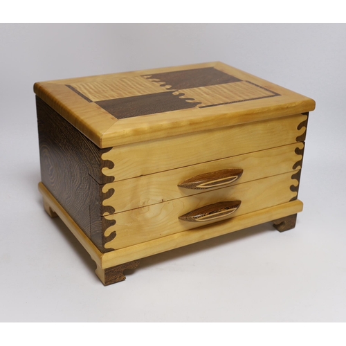 413 - A contemporary maple and wenge jewellery box, by Judd Lotts, 31cm wide, 23cm deep, 20cm high, togeth... 