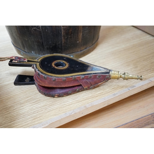 419 - A coopered brass bound oak bucket, 24.5cm and a small pair of lacquered bellows