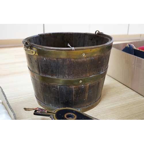 419 - A coopered brass bound oak bucket, 24.5cm and a small pair of lacquered bellows