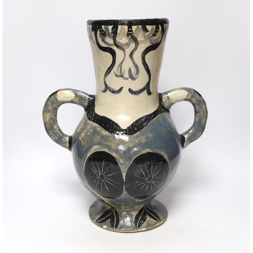 424 - A studio pottery vase, inspired by Picasso, 35cm