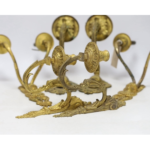 425 - A pair of ormolu two branch wall lights, a pair of single branch mask wall lights and a small pair o... 