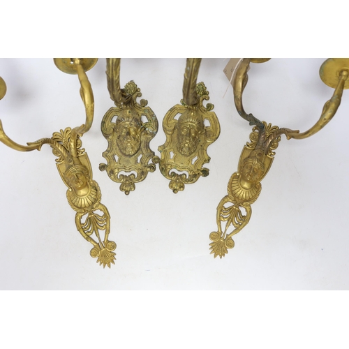 425 - A pair of ormolu two branch wall lights, a pair of single branch mask wall lights and a small pair o... 