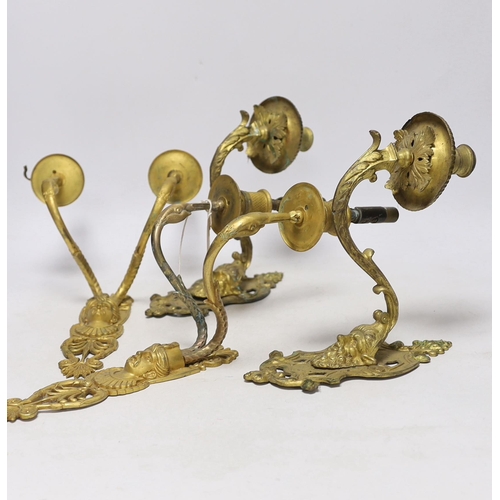 425 - A pair of ormolu two branch wall lights, a pair of single branch mask wall lights and a small pair o... 