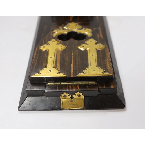 438 - A Victorian Betjemanns patent coromandel and gilt brass book slide, central plaque engraved F. Ald... 