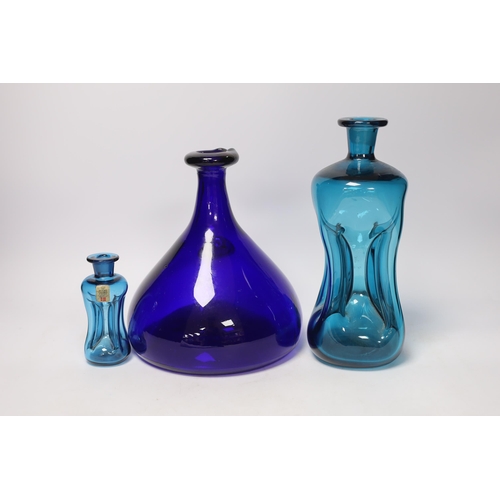 441 - Three Holmegaard blue glass decanters, tallest 26cm high