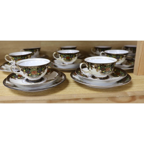 460 - A Japanese Noritake floral and gilt tea set, comprising a sugar bowl, a milk jug, nine cups, plus sa... 