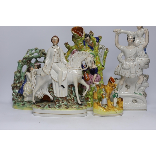 461 - Seven Staffordshire flat backs, including a gentleman on horse back, two seated lovers, a similar pa... 