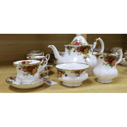 475 - Royal Albert Old Country Roses part tea set including six trios, teapot milk jug and sugar bowl, lar... 