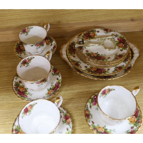 475 - Royal Albert Old Country Roses part tea set including six trios, teapot milk jug and sugar bowl, lar... 