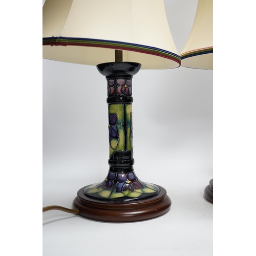 490 - Two Moorcroft lamp bases, in Oberon and Violet patterns, 47cm high