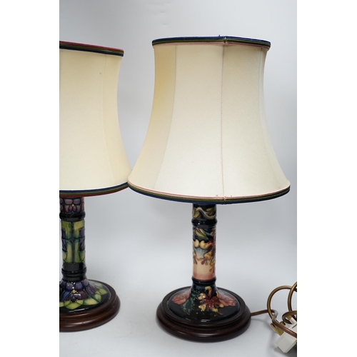 490 - Two Moorcroft lamp bases, in Oberon and Violet patterns, 47cm high