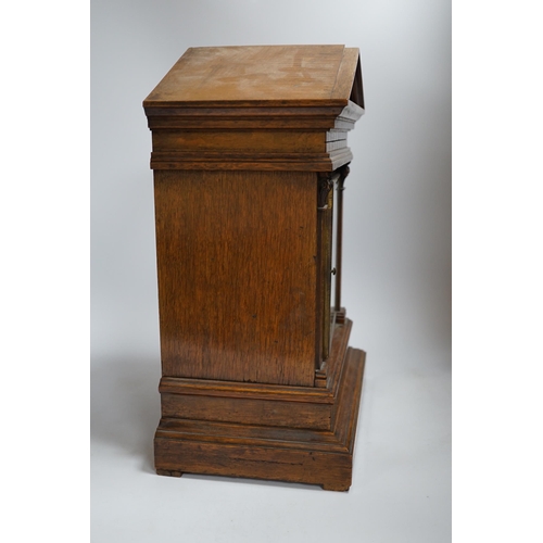 495 - An Edwardian oak mantel clock, dial inscribed J Duncan, Paisley, 41cm high