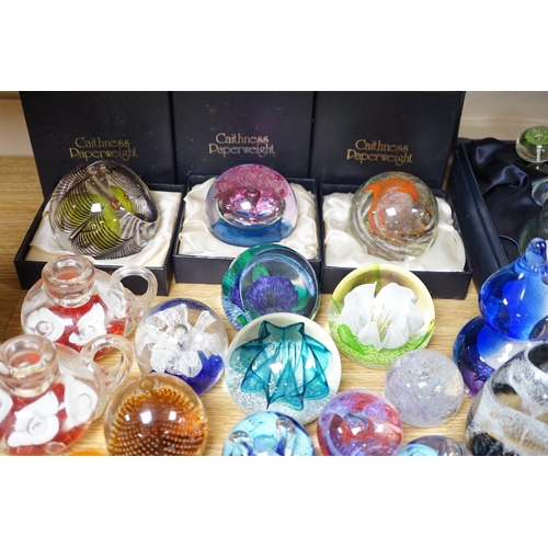 512 - A collection of mostly Caithness glass paperweights, 1980s-2000s, with various boxes