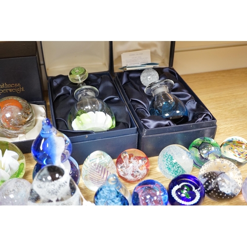 512 - A collection of mostly Caithness glass paperweights, 1980s-2000s, with various boxes