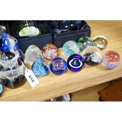 512 - A collection of mostly Caithness glass paperweights, 1980s-2000s, with various boxes