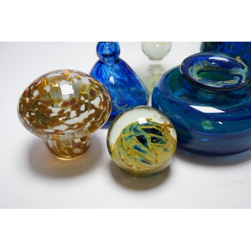 515 - A group of Mdina glass comprising three vases, a stemmed glass, three paper weights and a scent bott... 