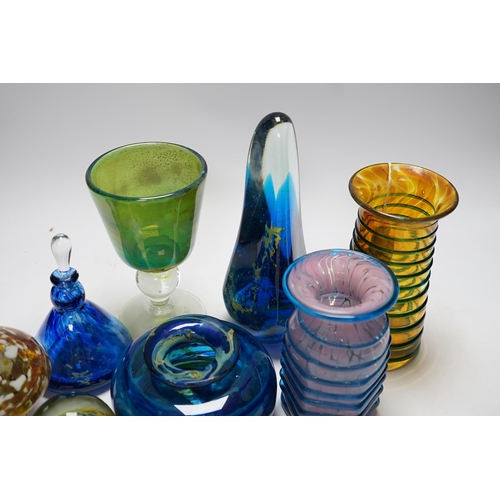 515 - A group of Mdina glass comprising three vases, a stemmed glass, three paper weights and a scent bott... 