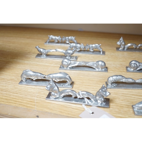 517 - A set of 12 French pewter novelty knife rests, in the form of squirrels, fish, snails, goats, etc.... 