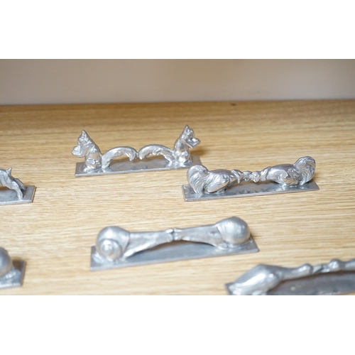 517 - A set of 12 French pewter novelty knife rests, in the form of squirrels, fish, snails, goats, etc.... 